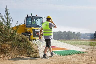 dumper with active sense control (object detection) recognizes man in front of dumper